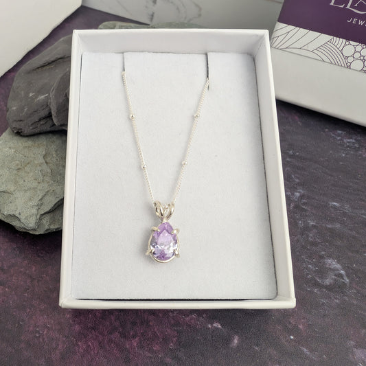 Claw set sparkle pear lilac necklace